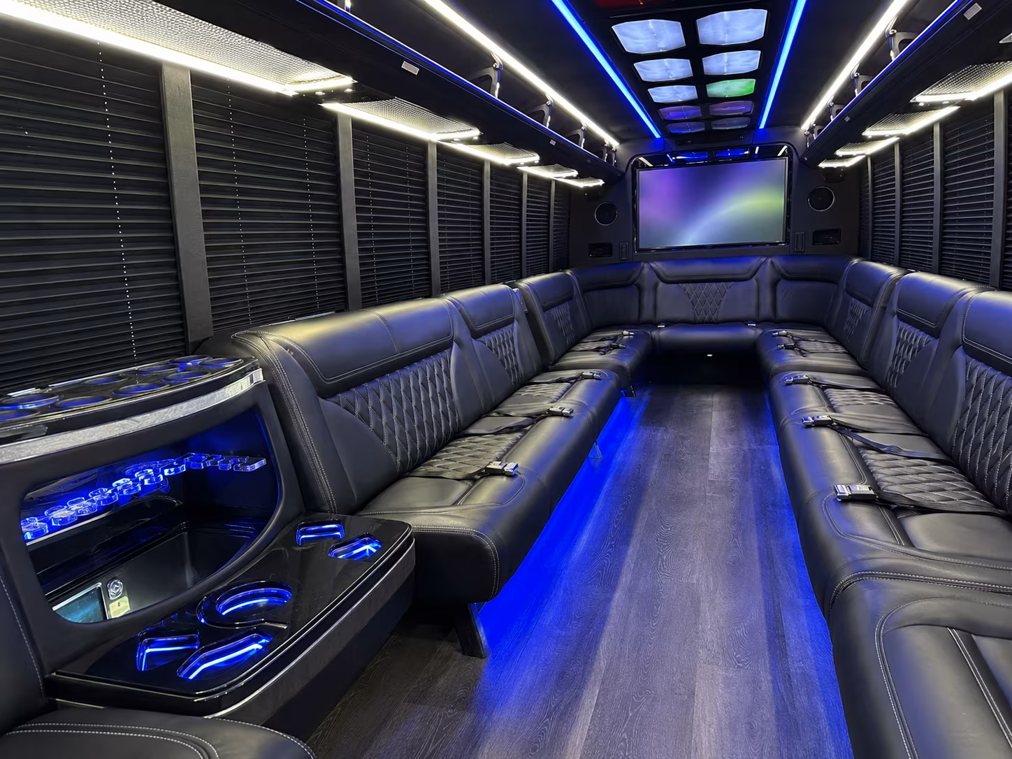 Wedding guests seated inside a party bus serving Cleveland
